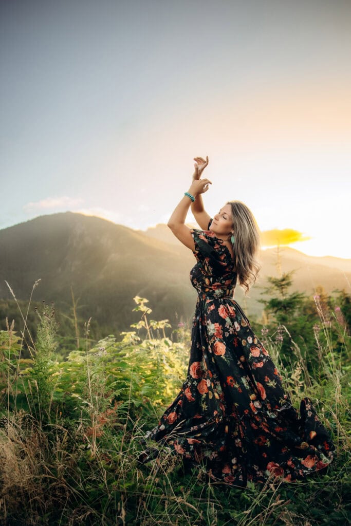 Family Photography, Photo of Liz wearing a floral dress standing in a field